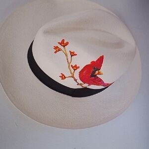 Chic Cream Hat with Red Bird Accent